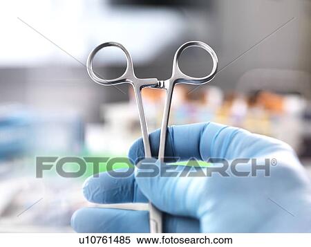 Close-up of surgical scissors in an operating theatre. View Large Photo Image Stock Photography - Close-up of surgical scissors in an operating theatre.. Fotosearch
