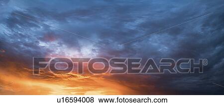 Stock Photo - Clouds at sunset.. Fotosearch