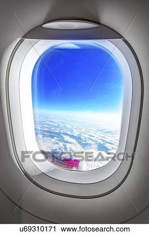 Clouds from aeroplane window. View Large Photo Image Stock Image - Clouds from aeroplane window.. Fotosearch