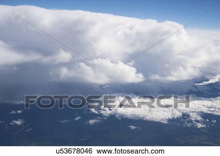Stock Photograph - Clouds from aeroplane window.. Fotosearch