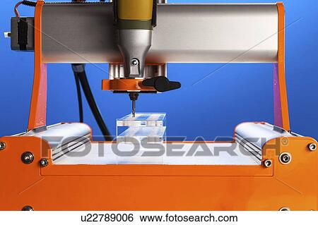 CNC milling machine drilling plastic block#. View Large Photo Image Stock Photograph - CNC milling machine drilling plastic block#.. Fotosearch
