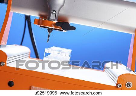 CNC milling machine drilling plastic block#. View Large Photo Image Stock Photography - CNC milling machine drilling plastic block#.. Fotosearch