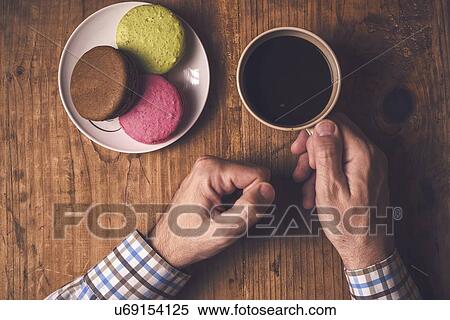 Stock Photography - Coffee and macaroons.. Fotosearch