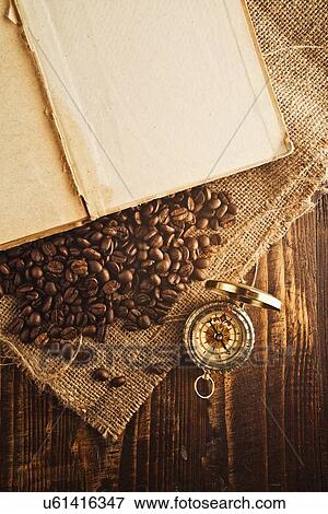Coffee beans and compass. View Large Photo Image Stock Photo - Coffee beans and compass.. Fotosearch