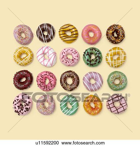 Colourful doughnuts, studio shot. View Large Photo Image Stock Image - Colourful doughnuts, studio shot.. Fotosearch