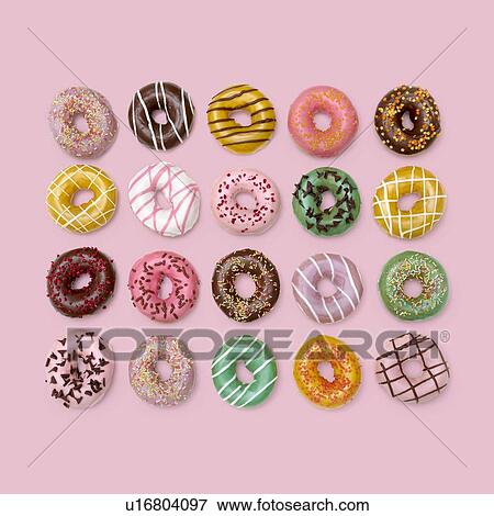 Colourful doughnuts, studio shot. View Large Photo Image Stock Photo - Colourful doughnuts, studio shot.. Fotosearch