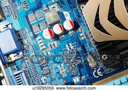 Stock Photo - Computer circuit board showing cooling system (right).. Fotosearch
