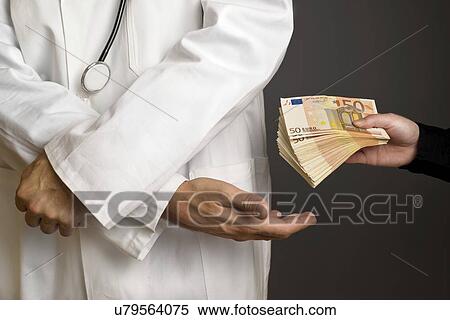 Stock Photography - Corruption in healthcare industry, conceptual image.. Fotosearch