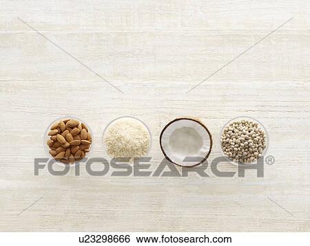 Stock Photograph - Dairy milk alternatives, studio shot.. Fotosearch