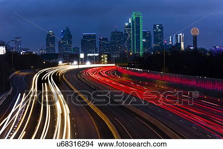 Dallas skyline and Tom Landry Freeway, Interstate 30 at night View Large Photo Image Picture - Dallas skyline and Tom Landry Freeway, Interstate 30 at night. Fotosearch
