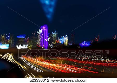 Dallas skyline and Tom Landry Freeway, Interstate 30 at night View Large Photo Image Stock Image - Dallas skyline and Tom Landry Freeway, Interstate 30 at night. Fotosearch