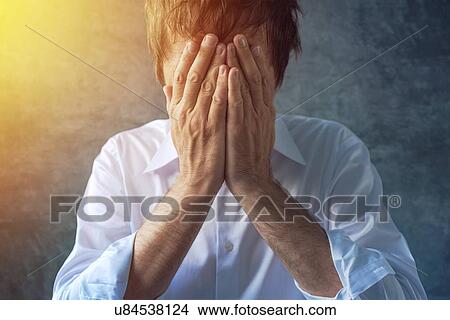 Picture - Depressed man.. Fotosearch
