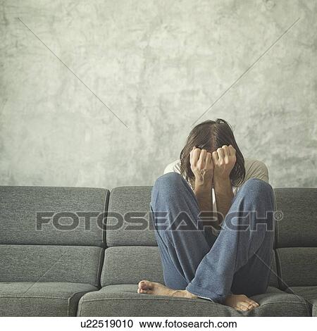 Stock Image - Depressed man.. Fotosearch