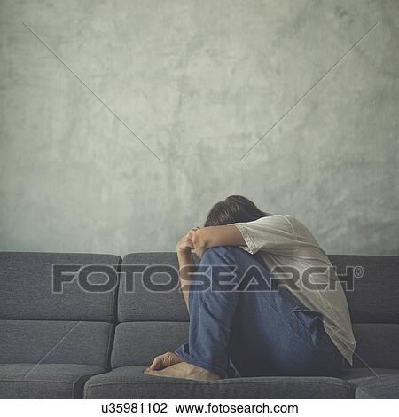 Stock Image - Depressed man.. Fotosearch