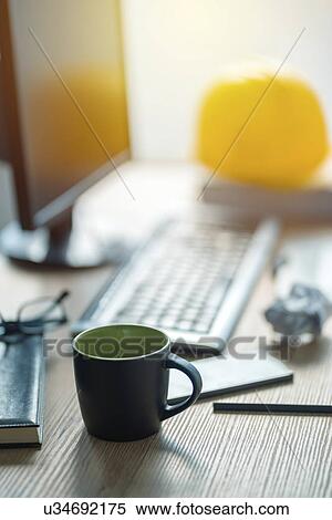 Stock Photography - Desk with mug.. Fotosearch