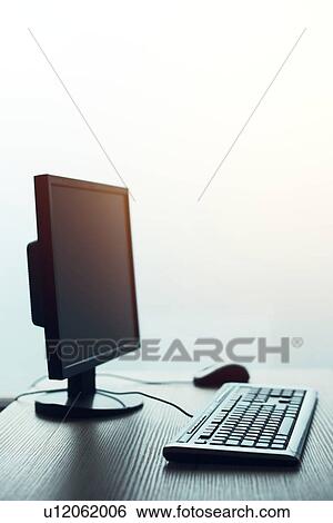 Desktop PC in empty office. View Large Photo Image Stock Photograph - Desktop PC in empty office.. Fotosearch