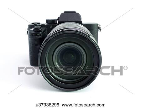 Stock Photography - Digital mirrorless camera with zoom lens.. Fotosearch