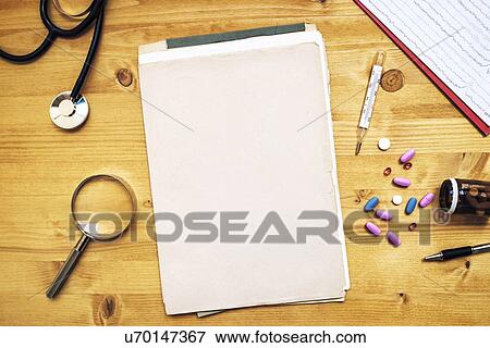 Doctor's desk, conceptual image. View Large Photo Image Stock Photo - Doctor's desk, conceptual image.. Fotosearch