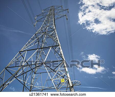 Stock Image - Electricity pylon and power lines, West Midlands, UK.. Fotosearch