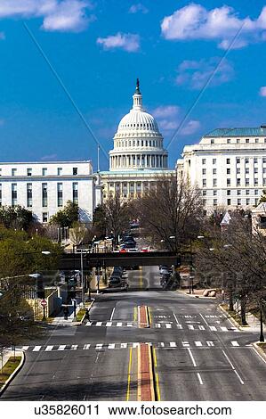 Stock Image - Elevated view down Capitol St, to US Capitol going towards US Capitol in Washington DC.. Fotosearch