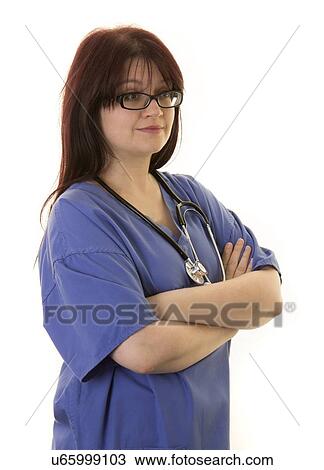Stock Image - Female doctor with arms folded and stethoscope, portrait.. Fotosearch