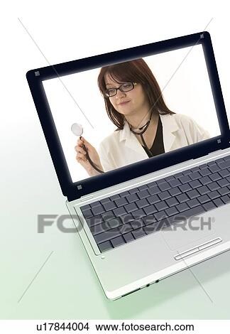Female doctor with stethoscope on laptop screen. View Large Photo Image Picture - Female doctor with stethoscope on laptop screen.. Fotosearch