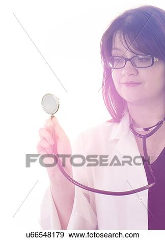 Stock Photo - Female doctor with stethoscope.. Fotosearch