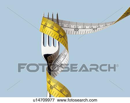 Fork with tape measure. View Large Photo Image Stock Photo - Fork with tape measure.. Fotosearch