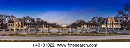 Stock Image - Fountains and World War II Memorial at Sunrise, Washington D. C. . Fotosearch