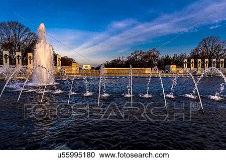 Stock Image - Fountains and World War II Memorial at Sunrise, Washington D. C. . Fotosearch