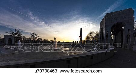 Stock Image - Fountains and World War II Memorial at Sunrise, Washington D. C. . Fotosearch