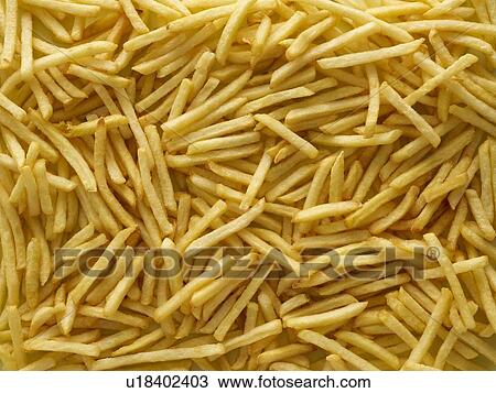 Stock Image - French fries, full frame.. Fotosearch