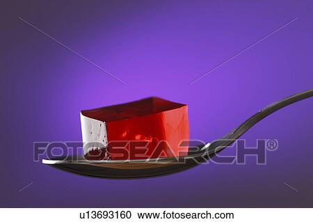 Fruit jelly on a spoon View Large Photo Image Stock Image - Fruit jelly on a spoon. Fotosearch