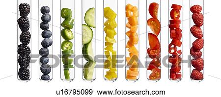 Stock Photo - Fruits and vegetables in test tubes, studio shot.. Fotosearch