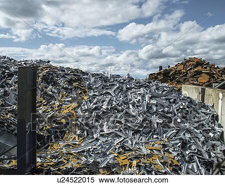 Stock Photography - Heaps of steel (ferrous) and non-ferrous scrap metal in a scrapworks.. Fotosearch