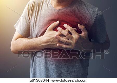 Heart burn, conceptual image. View Large Photo Image Picture - Heart burn, conceptual image.. Fotosearch