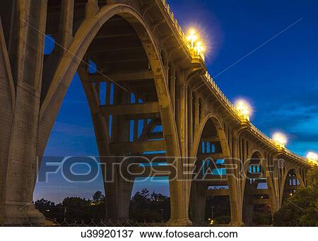 Stock Photo - Historic Colorado Bridge Arches at dusk, Pasadena, CA. Fotosearch
