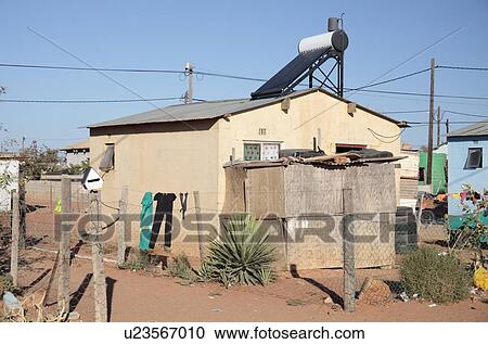 House on an informal settlement (township) with a solar water heater, Vredendal, Western Cape, South Africa. View Large Photo Image Stock Image - House on an informal settlement (township) with a solar water heater, Vredendal, Western Cape, South Africa.. Fotosearch
