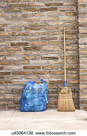 Household broom and bag of rubbish. View Large Photo Image Stock Photo - Household broom and bag of rubbish.. Fotosearch