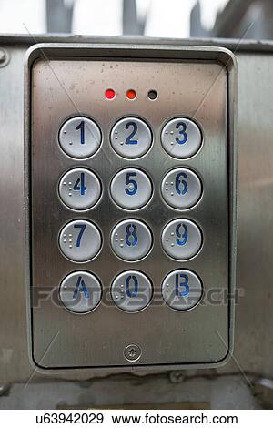 Intercom keypad with braille at entrance to industrial site. View Large Photo Image Stock Photo - Intercom keypad with braille at entrance to industrial site.. Fotosearch