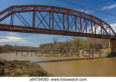 Iron Railroad Bridge over water, Texas View Large Photo Image Stock Image - Iron Railroad Bridge over water, Texas. Fotosearch