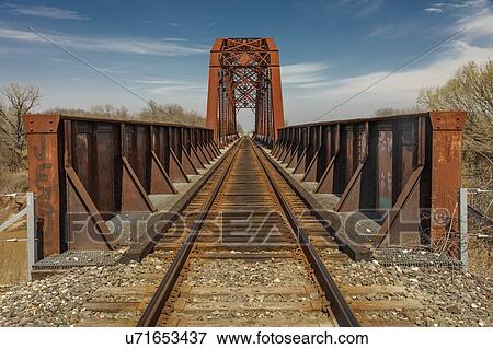Iron Railroad Bridge over water, Texas View Large Photo Image Stock Photo - Iron Railroad Bridge over water, Texas. Fotosearch