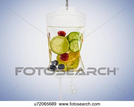 Stock Photo - IV bag with fruits, studio shot.. Fotosearch