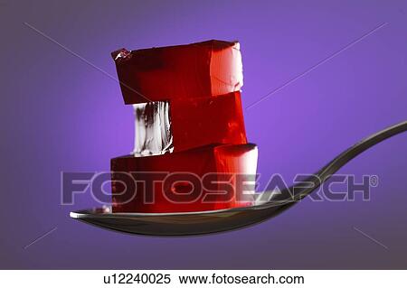 Stock Photography - Jelly on a spoon.. Fotosearch