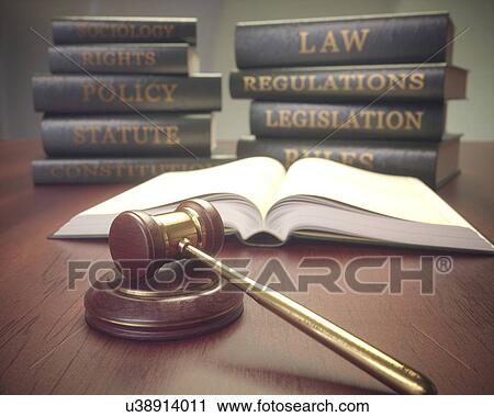 Stock Image - Judge's gavel and books.. Fotosearch
