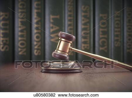 Stock Image - Judge's gavel and books.. Fotosearch
