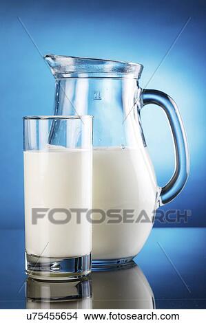 Picture - Jug and glass of milk.. Fotosearch