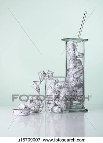 Laboratory glassware with tape measures. View Large Photo Image Stock Photo - Laboratory glassware with tape measures.. Fotosearch