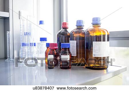 Stock Photo - Laboratory solutions and glassware.. Fotosearch