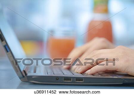 Stock Image - Laptop use.. Fotosearch